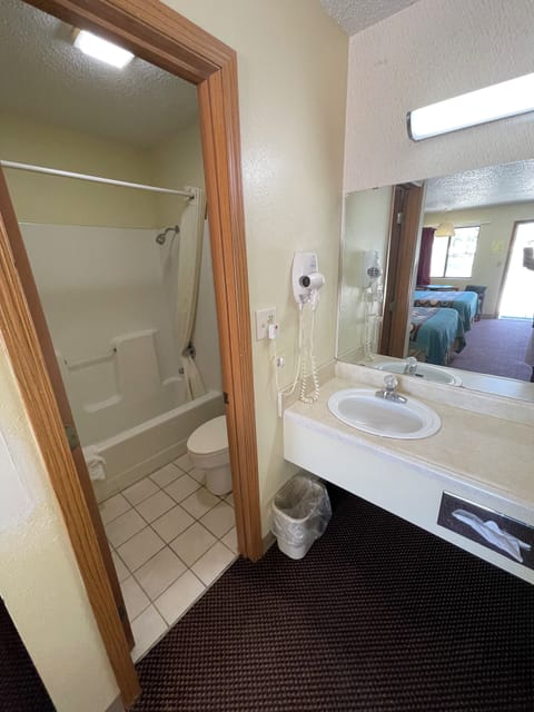 Standard Room, 2 Queen Beds, Non Smoking | Bathroom | Bathtub, towels