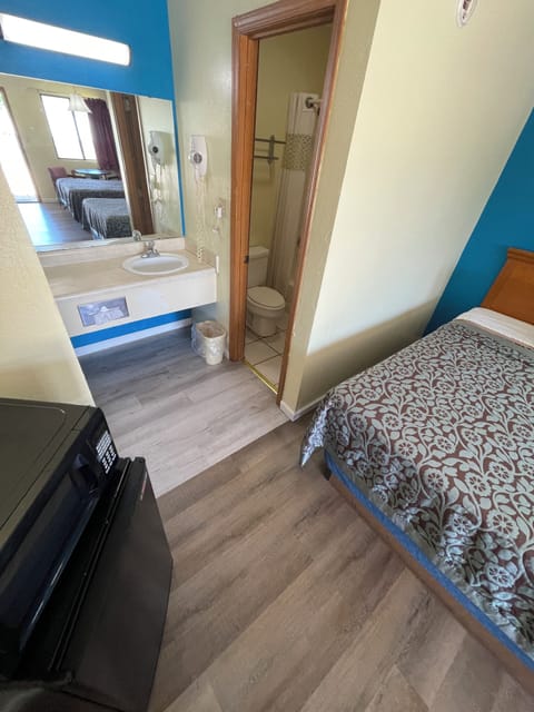 Standard Room, 2 Queen Beds, Non Smoking | Bathroom | Bathtub, towels
