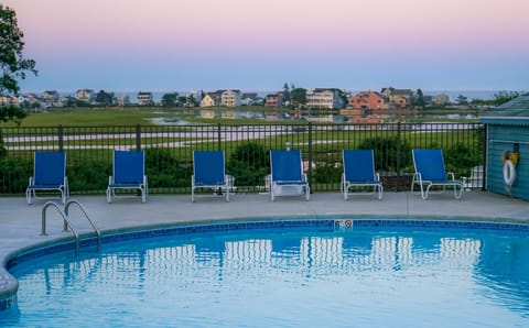 Indoor pool, seasonal outdoor pool, pool umbrellas, sun loungers