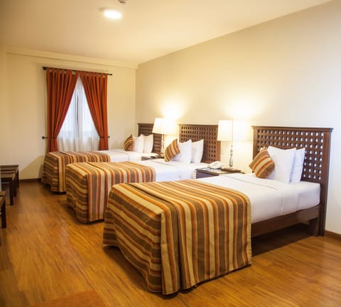 Room, 3 Twin Beds | In-room safe, blackout drapes, free WiFi, bed sheets