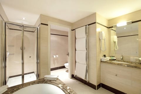 Separate tub and shower, free toiletries, hair dryer, towels