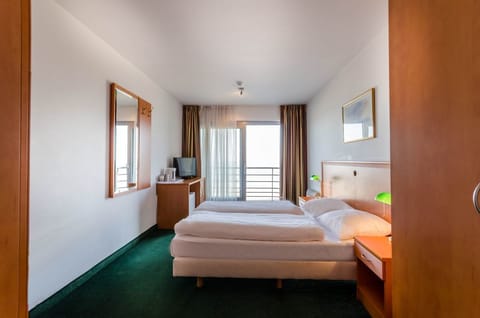 Premium bedding, down comforters, blackout drapes, cribs/infant beds