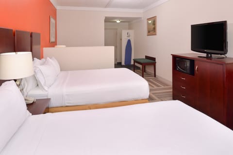 Suite, 2 Double Beds | Desk, iron/ironing board, free cribs/infant beds, free rollaway beds