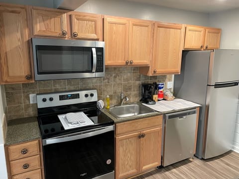 Deluxe Condo, 2 Bedrooms | Private kitchen | Full-size fridge, microwave, oven, dishwasher