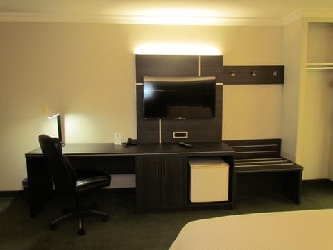 Room, 2 Queen Beds, Non Smoking | Living area | 32-inch TV with cable channels