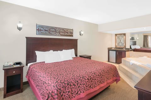 Suite, 1 King Bed, Non Smoking (One-Bedroom) | In-room safe, desk, iron/ironing board, free cribs/infant beds
