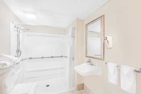 Room, 1 Queen Bed, Accessible, Smoking | Bathroom | Combined shower/tub, hair dryer, towels