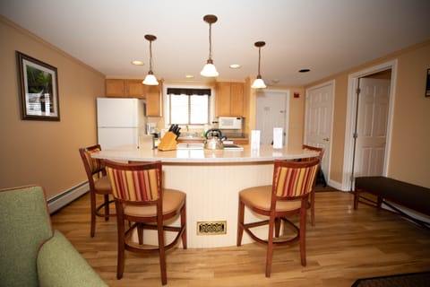 Deluxe Room, 1 Bedroom | Private kitchen | Full-size fridge, microwave, stovetop, dishwasher