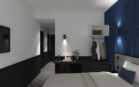 Deluxe Double Room | Minibar, in-room safe, desk, blackout drapes