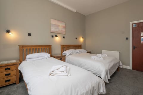 Room | Premium bedding, Select Comfort beds, desk, blackout drapes