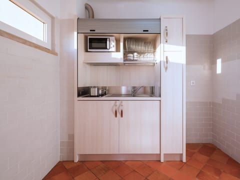 Apartment, 2 Bedrooms, Sea View | Private kitchen | Fridge, microwave, stovetop, electric kettle