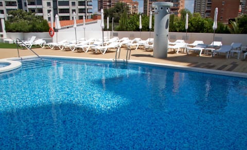 Outdoor pool, open 9:00 AM to 7:00 PM, pool umbrellas, sun loungers