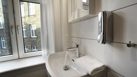 Economy Triple Room, Shared Bathroom (Double Bed and Sofa Bed) | Desk, iron/ironing board, free WiFi, bed sheets