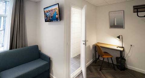 Standard Triple Room, Private Bathroom (Twin Beds and Sofa Bed) | Desk, iron/ironing board, free WiFi, bed sheets