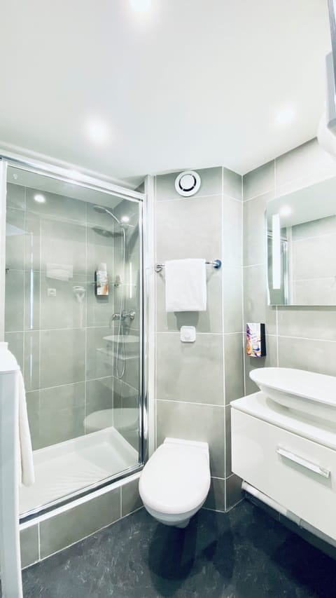 Shower, free toiletries, hair dryer, towels