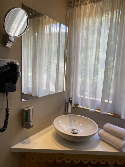 Superior Double Room | Bathroom | Shower, rainfall showerhead, hair dryer, bathrobes