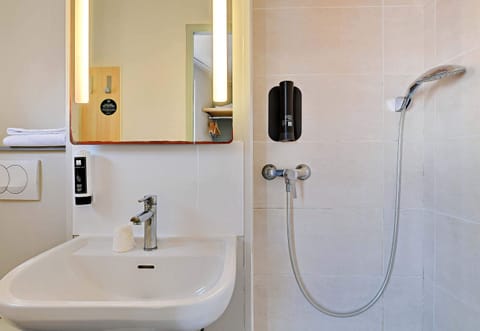 Shower, free toiletries, hair dryer, towels