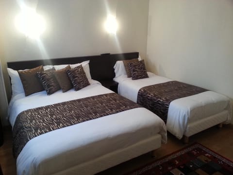 Standard Triple Room | Premium bedding, desk, iron/ironing board, free WiFi