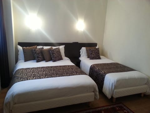 Premium bedding, desk, iron/ironing board, free WiFi