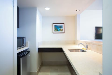 Suite, 1 Bedroom, Oceanfront | Private kitchen | Fridge, microwave, coffee/tea maker