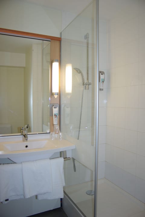 Shower, eco-friendly toiletries, hair dryer, towels