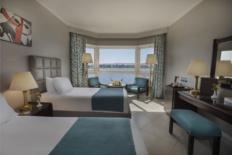 Premium Room, River View | In-room safe, desk, bed sheets