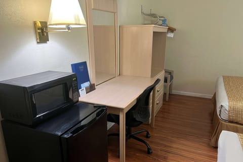 Desk, iron/ironing board, free cribs/infant beds, rollaway beds