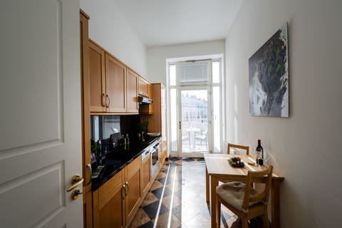 Grand Suite | Private kitchen | Full-size fridge, stovetop, dishwasher, coffee/tea maker