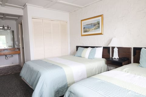 Standard Room, 2 Queen Beds, Beachside | Iron/ironing board, free cribs/infant beds, free WiFi, bed sheets