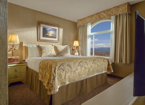 One Bedroom King Suite | Premium bedding, in-room safe, blackout drapes, iron/ironing board