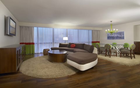 Metropolitan Suite, 1 King & 2 Queens | Living area | Flat-screen TV, pay movies