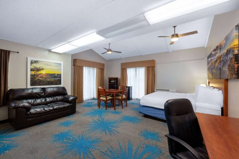 Suite, 1 King Bed, Non Smoking, Microwave | Desk, blackout drapes, iron/ironing board, free cribs/infant beds