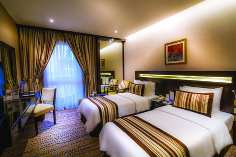 Deluxe Room, 2 Twin Beds | Minibar, in-room safe, iron/ironing board, rollaway beds