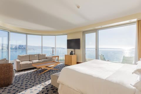 Suite, 1 King Bed, Balcony, Oceanfront | Minibar, in-room safe, individually decorated, desk