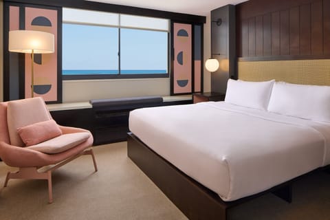 Premium Ocean View King with Balcony | In-room safe, desk, laptop workspace, blackout drapes