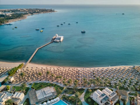 Sun loungers, beach towels, beach volleyball, beach bar