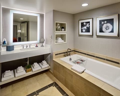 Suite, 1 King Bed with Sofa bed (Executive Suite) | Bathroom | Combined shower/tub, free toiletries, hair dryer, towels