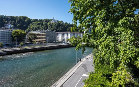 Double Room, Balcony, River View | In-room safe, desk, iron/ironing board, free cribs/infant beds