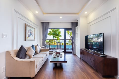 Family Sea View | Living area | Flat-screen TV