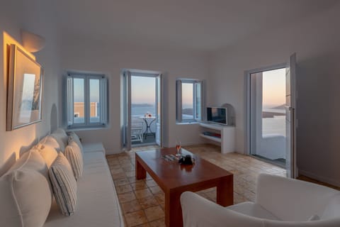 Suite (Rigoletto) Caldera View | Living area | Flat-screen TV