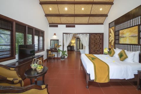 Bungalow, Pool View | Minibar, in-room safe, individually decorated, laptop workspace