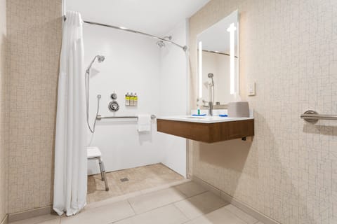 Standard Room, 1 King Bed, Accessible (Mobility Roll-In Shower) | Bathroom | Hair dryer, towels