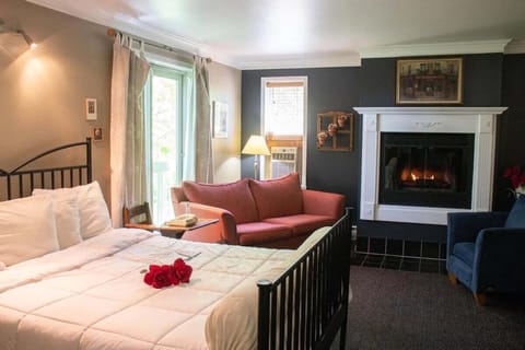 Superior Queen Room with Fireplace | Individually decorated, desk, iron/ironing board, free WiFi