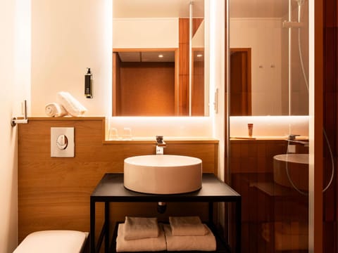 Eco-friendly toiletries, hair dryer, towels, soap