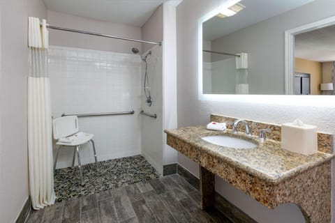 Room, 2 Queen Beds, Accessible, Non Smoking (Mobility,Tub w/Grab Bars) | Bathroom | Hydromassage showerhead, free toiletries, hair dryer, towels