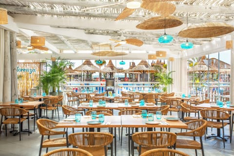 Breakfast, dinner served; international cuisine, pool views