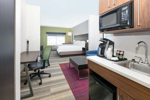 Suite, 1 King Bed | In-room safe, desk, iron/ironing board, cribs/infant beds