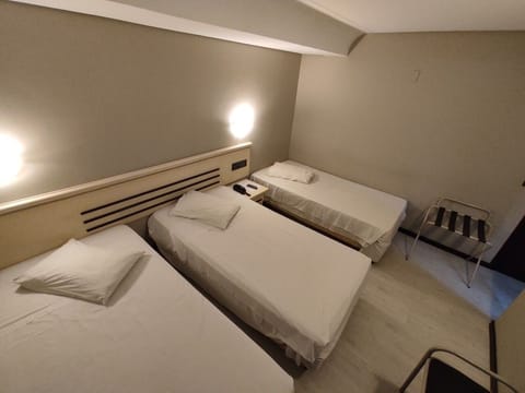 Standard Triple Room | In-room safe, desk, free WiFi, bed sheets