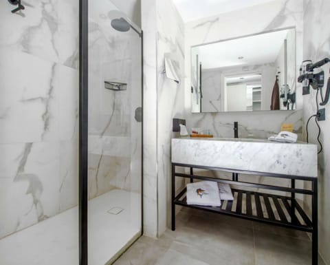 Suite | Bathroom | Separate tub and shower, rainfall showerhead, hair dryer, towels