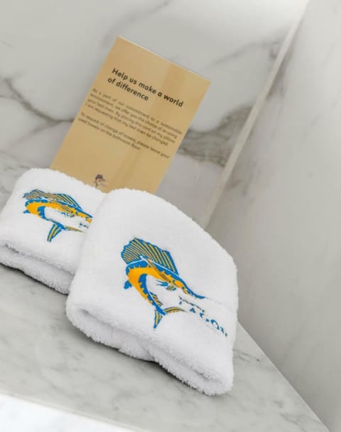 Suite | Bathroom amenities | Separate tub and shower, rainfall showerhead, hair dryer, towels